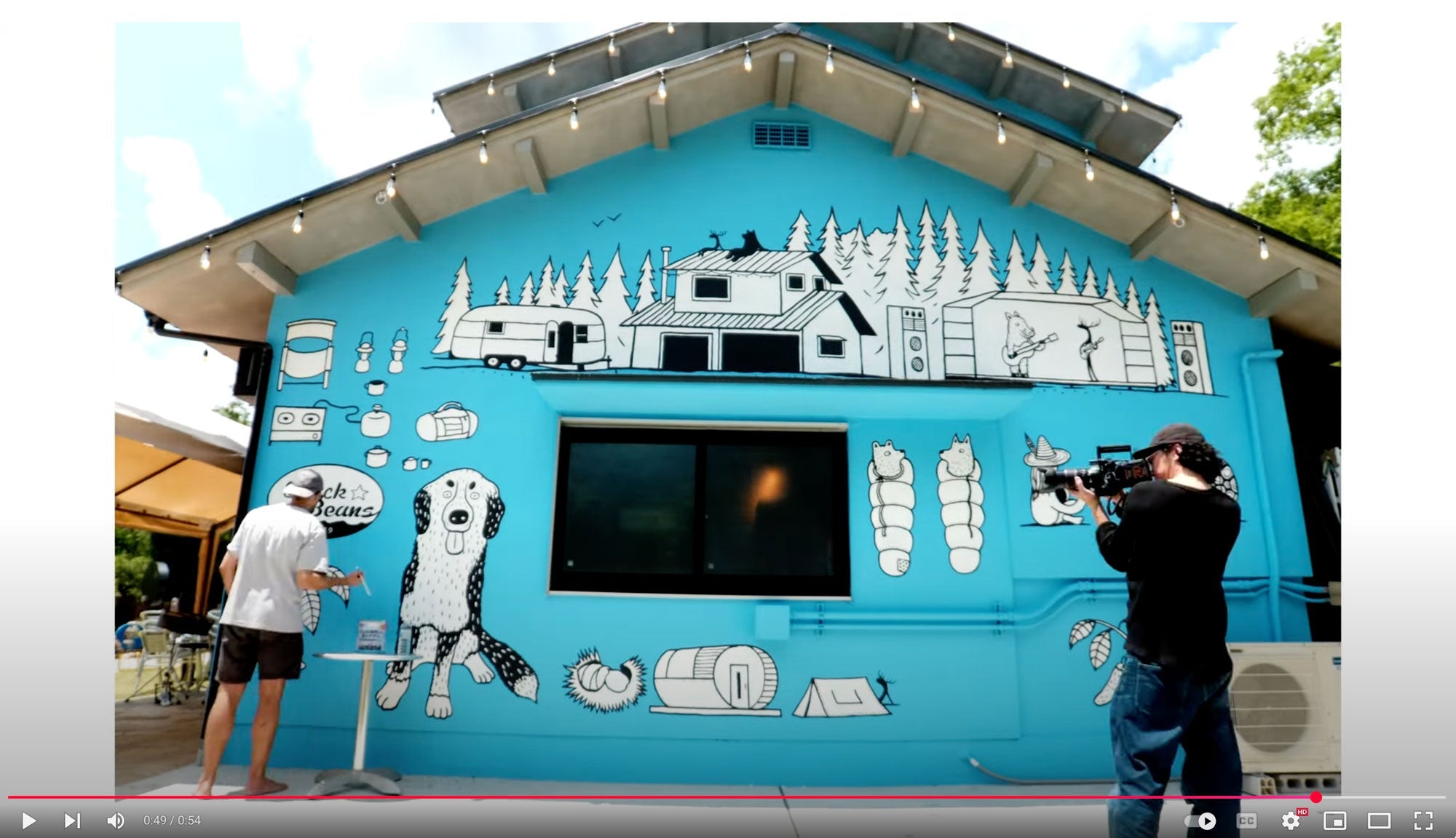 Painting a Mural for Black Beans Camp Resort