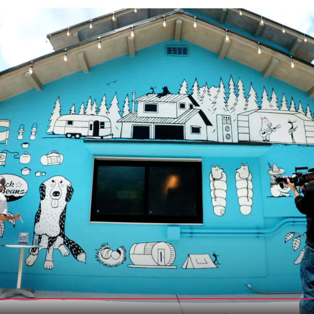 Painting a Mural for Black Beans Camp Resort